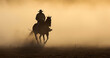 Silhouette of a man riding a horse wearing a cowboy hat in the dust of the prairie.