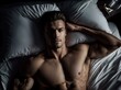 Man Lying in Bed Without Shirt, Relaxed and Comfortable. Generative AI.