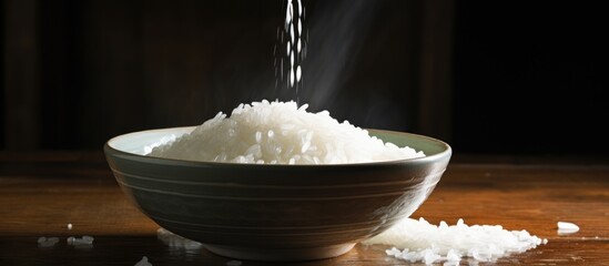 Wall Mural - Milk-like water cleans rice, with rough rice in bowl.