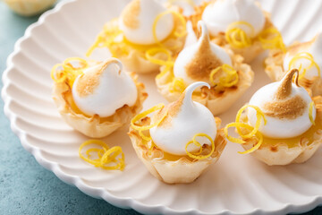 Wall Mural - Little lemon meringue tartlets with filo pastry base