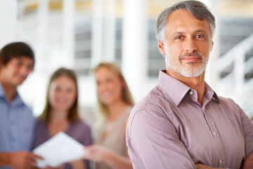 Canvas Print - Office, confidence and portrait of business man with team for leadership, crossed arms and pride. Corporate, company and happy worker with staff for meeting, planning and collaboration in workplace