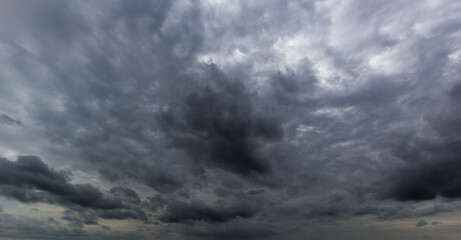 Aufkleber - Bad or moody weather sky and environment. carbon dioxide emissions, greenhouse effect, global warming, climate change. The dark sky with heavy clouds converging and a violent storm before the rain.