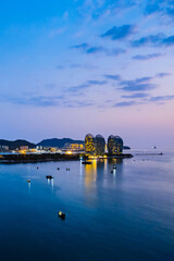 Poster - Night view aerial photography of Phoenix Island and skyline in Sanya Bay, Hainan, China