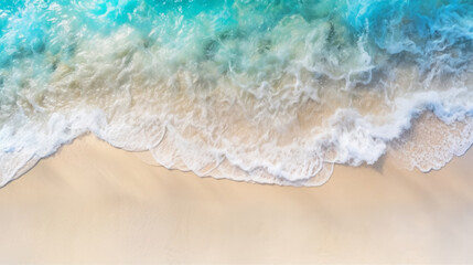 Top view on the tropical sandy seashore and waves with copy space