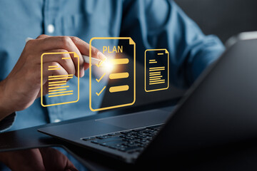 Planning task and Online survey filling out digital form checklist by laptop computer, Document Management Checking System, online documentation database and process manage files.