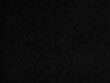 © Nuttawut - Patterned black faux leather background used for graphic design.