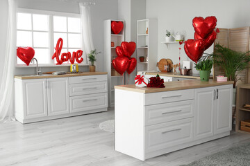 Wall Mural - Interior of light kitchen decorated for Valentine's Day with counters and balloons