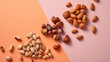 © Olga - a bunch of nuts sitting next to each other on top of a pink and orange surface with a pink and orange background next to the nuts on top of the picture.