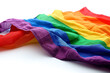 © Nataliia_Trushchenko - The gay pride rainbow flag waving against clean blue sky, close up, isolated with clipping path mask alpha channel transparency. Rainbow flag as a symbol