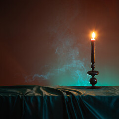 Wall Mural - burning candles on dark background