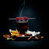 Fototapeta Tulipany - Winter tea with raspberries and citrus