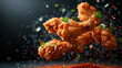 Delicious fried chicken wings mix with spicy ingredients herbs on dark background
