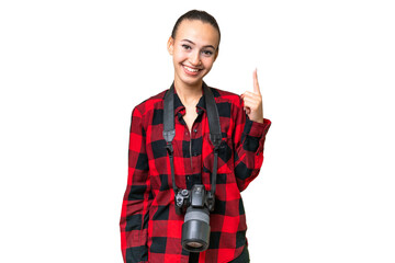 Wall Mural - Young photographer Arab woman over isolated background pointing with the index finger a great idea