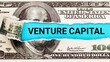 Venture Capital. The word Venture Capital in the background of the US dollar. Investment in Innovation, New Business, and Growth Concept
