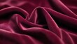 burgundy red wavy silk background with folds, macro, studio light