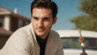 © Artur - Young Man with Amber Eyes: Sitting Contemplatively Next to Car, Warm Smile and Sophisticated Style