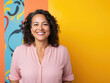 © CostantediHubble - Portrait of a middle aged hispanic woman smiling with joy. Colorful bright background
