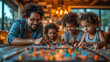 Familienspaß: Junge Familie spielt gemeinsam Brettspiele mit den Kindern // Family fun time: Young family plays boardgames together with kids