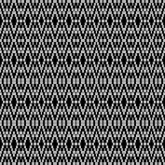 Wall Mural - Seamless geometric pattern in ethnic style. Black and white background.