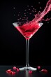 © Dina - red valenties day cocktail with splashes in martini glass isolated on black background