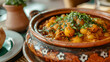 tagine - Moroccan speciality in a clay bowl, closeup