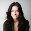 © Benjamin - young happy long black haired woman posing and looking in camera,white background