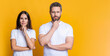 © be free - Boyfriend and girlfriend. Pondering couple of man and woman isolated on yellow. Family couple relationship. Millennial man and woman wear white tshirt. Casual style of millennial couple. Copy space