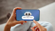 © Prostock-studio - Woman hands using chatbot on smartphone, home interior