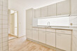 © ADDICTIVE STOCK - Modern minimalist kitchen with white cabinetry