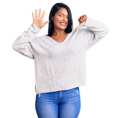 Poster - Hispanic woman with long hair wearing casual clothes showing and pointing up with fingers number six while smiling confident and happy.