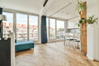 © ADDICTIVE STOCK - Bright modern apartment with cityscape view