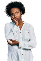 Canvas Print - African american woman with afro hair wearing casual white t shirt thinking looking tired and bored with depression problems with crossed arms.