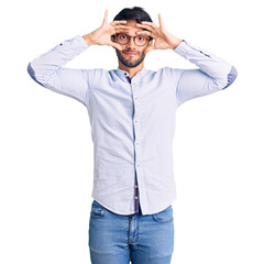 Poster - Handsome hispanic man wearing business shirt and glasses trying to open eyes with fingers, sleepy and tired for morning fatigue