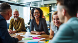 Fototapeta  - Multicultural Team Laughing Together During a Creative Meeting, Workplace Collaboration and Positive Company Culture Concept