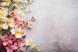 Fototapeta Kwiaty - Bunch of spring flowers on textured table backgound with a lot of copy space for text. Top view, close up, flat lay composition. - generative ai