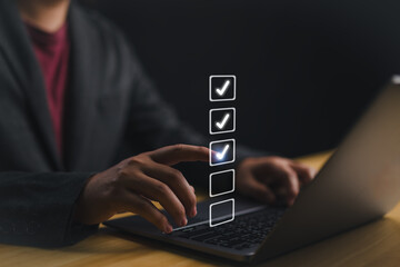 Poster - Business performance checklist, businessman using laptop doing online checklist survey, filling out digital form checklist, take an assessment, questionnaire, evaluation, survey, online exam.