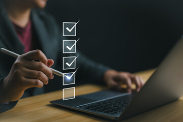 Poster - Business performance checklist, businessman using laptop doing online checklist survey, filling out digital form checklist, take an assessment, questionnaire, evaluation, online survey, online exam.