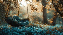  A Swing Chair Sitting In The Middle Of A Forest With Blue Flowers On The Ground And Trees In The Background.