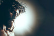 Jesus Christ wearing crown of thorns Passion and Resurrection solid black background. ai generative