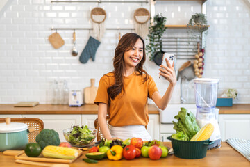 Wall Mural - Portrait of beauty body slim healthy asian woman eating vegan food healthy with fresh vegetable salad in kitchen at home.diet, vegetarian, fruit, wellness, health, green food.Fitness and healthy food