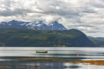 Wall Mural - Norway. Landscape with fjord, boat and mountains on a summer day