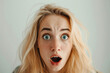 Surprised Expression: Blonde Woman's Eyes Wide Open And Mouth Agape