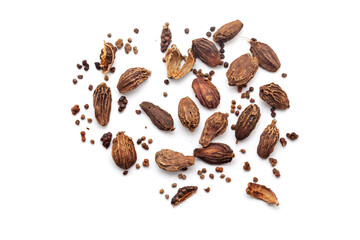 Wall Mural - Top view of Dry organic Black cardamom (Amomum subulatum), isolated on a white background.