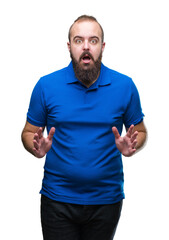 Sticker - Young caucasian hipster man wearing blue shirt over isolated background afraid and shocked with surprise expression, fear and excited face.