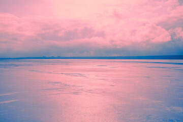 Wall Mural - View of the lake and cloudy sky at sunset. Panoramic view from above at Pink Lake. Minimalist landscape