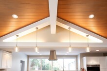 ceiling with multiple beams and spotlights installation