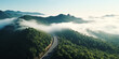 morning in the mountains  the road in the fog