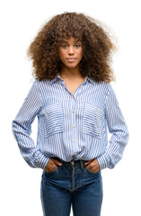 Sticker - African american woman wearing a stripes shirt with a confident expression on smart face thinking serious