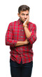 © Krakenimages.com - Young handsome man over isolated background thinking looking tired and bored with depression problems with crossed arms.