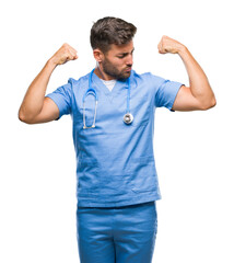 Sticker - Young handsome doctor surgeon man over isolated background showing arms muscles smiling proud. Fitness concept.